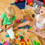 Two Kids Playing on the Floor