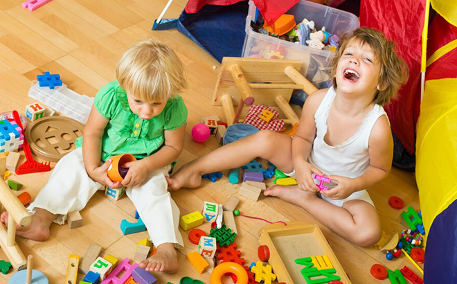 Two Kids Playing on the Floor