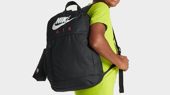 a Kid with Nike Air Kids Backpack