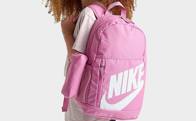 a Kid with Nike Kids Elemental Backpack