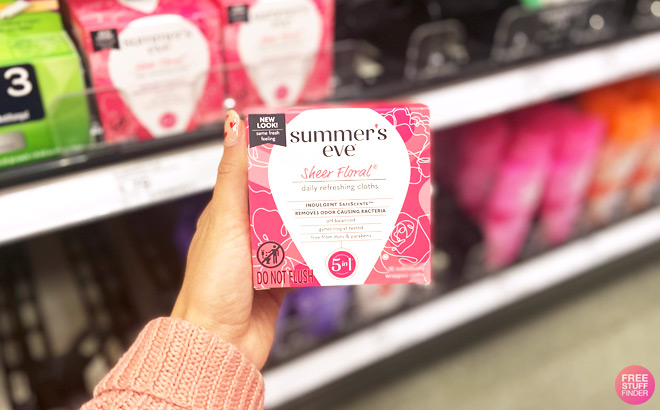 a Person Holding Summers Eve Simply Sensitive Daily Feminine Wipes 1