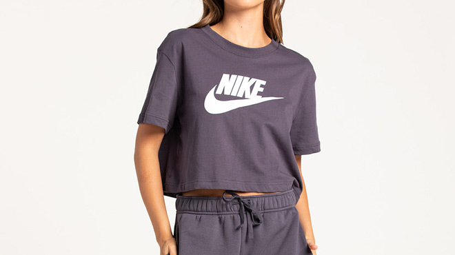 a Person Wearing Nike Sportswear Essential Womens Crop Tees