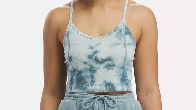 a Person Wearing Reebok Classics Natural Dye Marble Tank Top