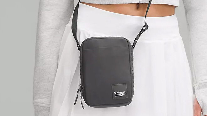 a Person with Lululemon Easy Access Crossbody Bag