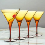 4 Piece Champagne Coupe Glass Set on a Table