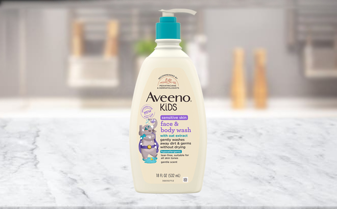 A Bottle of Aveeno Kids Face Body Wash on a Table