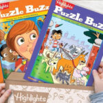 A Child Holding Two Highlights Puzzle Buzz Books