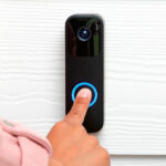 A Finger pressing on a Blink Smart Wifi Video Doorbell