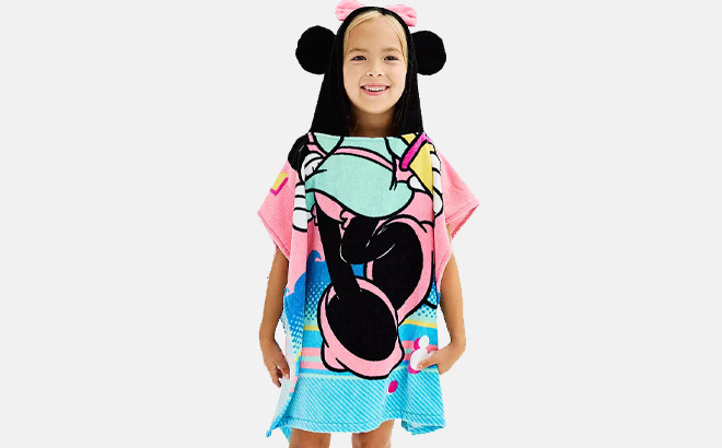 A Kid is Wearing The Big One Disneys Minnie Mouse Hooded Towel Poncho