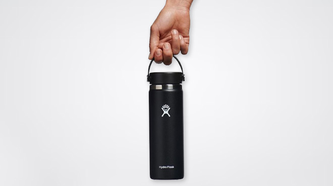 A Man Holding Hydro Flask Wide Mouth Stainless Steel Bottle