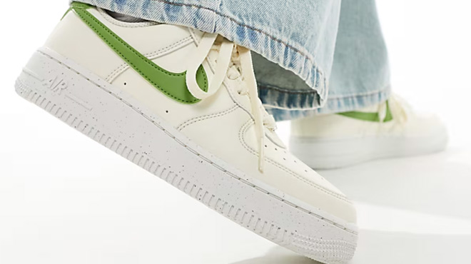 A Man Wearing Nike Air Force 1 Shoes