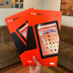 A Person Holding Amazon Fire Tablet Bundle