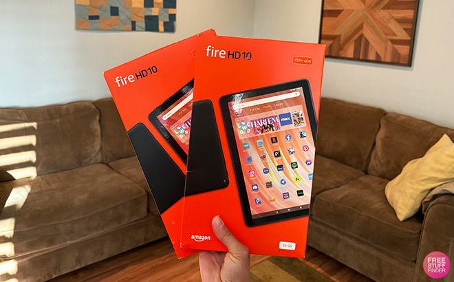 A Person Holding Amazon Fire Tablet Bundle