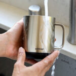 A Person Holding Ember Temperature Control Smart Mug