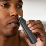 A Person Holding Nose Hair Trimmer