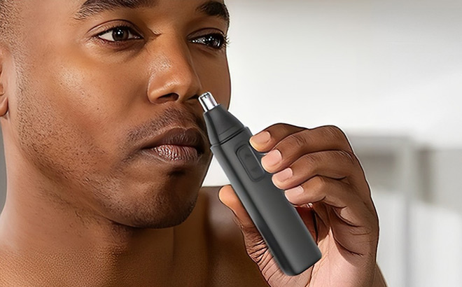 A Person Holding Nose Hair Trimmer