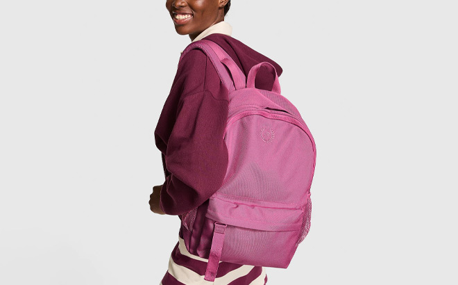 A Person Holding Victorias Secret Pink Ivy Classic Canvas Backpack