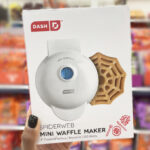 A Person Holding a Dash Spider Web Mini Waffle Maker