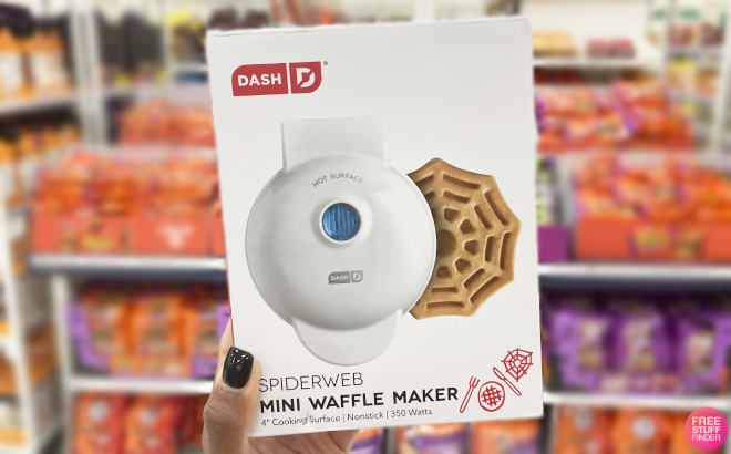 A Person Holding a Dash Spider Web Mini Waffle Maker