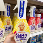 A Person Holding the Mr Clean Clean Freak Freak Multi Surface Cleaning Spray