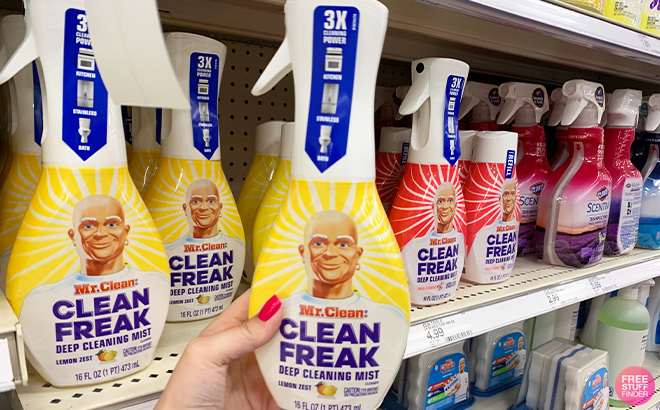 A Person Holding the Mr Clean Clean Freak Freak Multi Surface Cleaning Spray