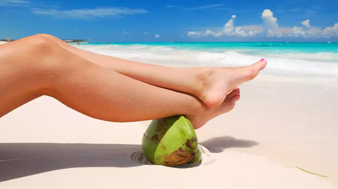 A Person Lying on a Beach