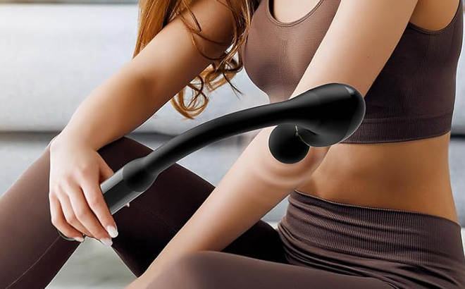 A Person Using FVZ 10MM Deep Tissue Massage Gun