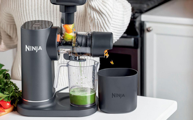 A Person Using Ninja Juicer