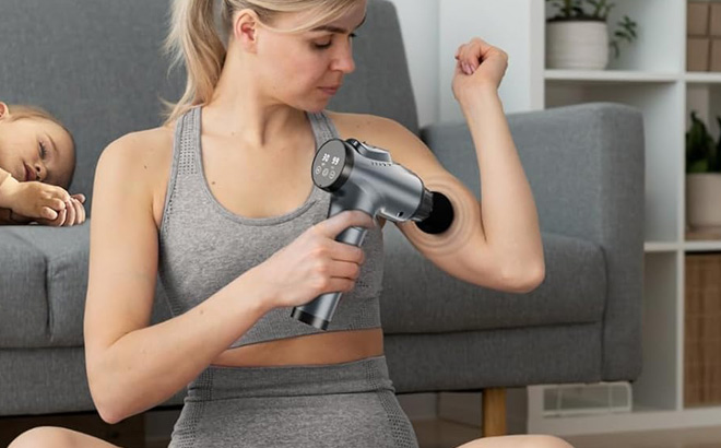 A Person Using a Massage Gun