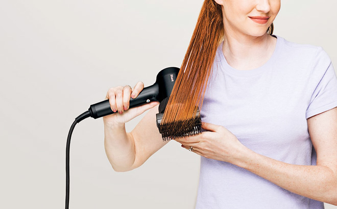 A Person Using a Shark HyperAIR Blow Dryer