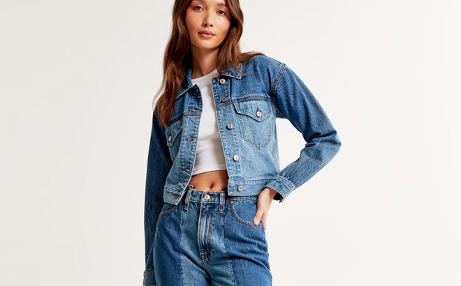 A Person Wearing Abercrombie Fitch Drapey Cropped Denim Jacket