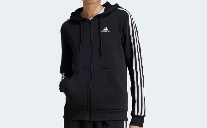 A Person Wearing Adidas Essentials Fleece Hoodie