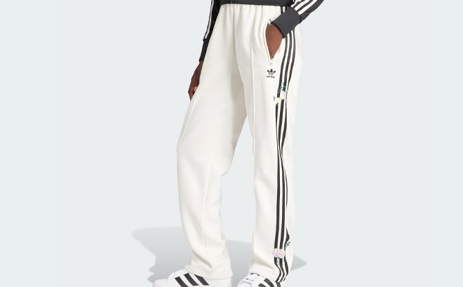 A Person Wearing Adidas Flower Pants