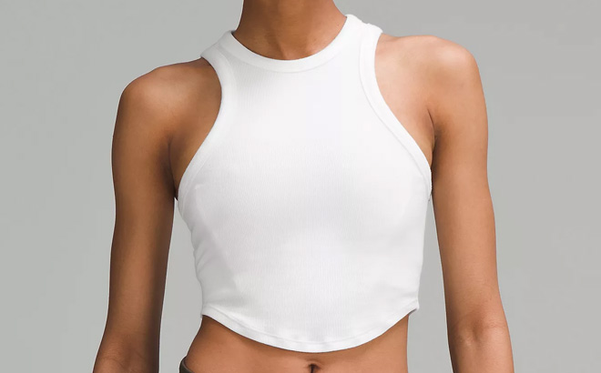 A Person Wearing Lululemon Hold Tight Cropped Tank Top in White