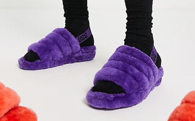 A Person Wearing UGG Fluff Yeah Slides