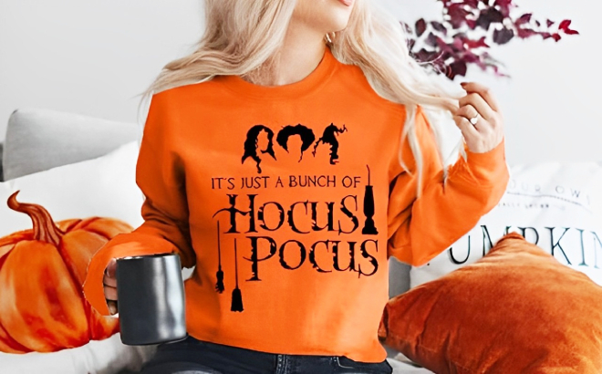 A Person Wearing an Its Just A Bunch of Hocus Pocus Sweatshirt