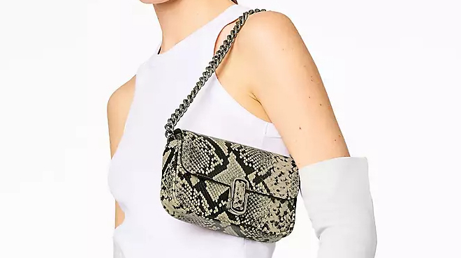 A Person wearing a Marc Jacobs The Snake Embossed J Marc Mini Bag