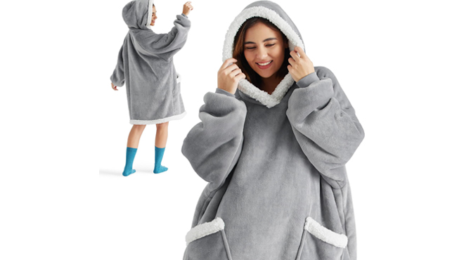 A Person wearing a Wearable Blanket Hoodie with Sleeves