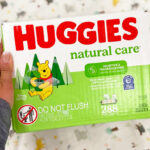 A Woman Holding Huggies 288 Count Natural Care Baby Wipes