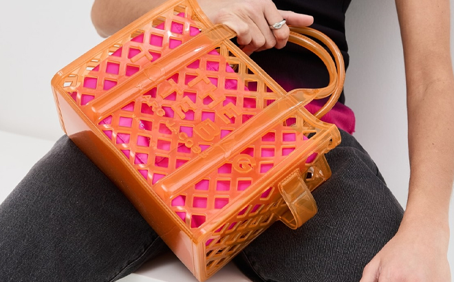 A Woman Holding Marc Jacobs The Jelly Small Tote Bag