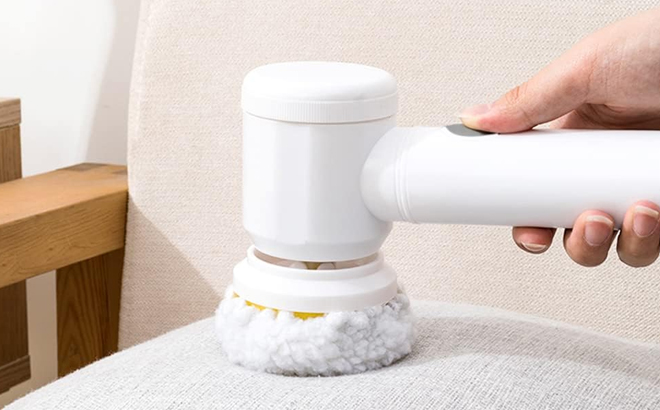 A Woman Holding Minlebao Cordless Electric Spin Scrubber