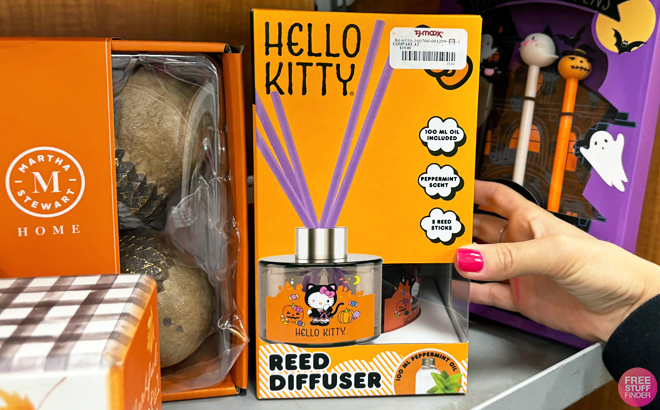 A person hilding a Hello Kitty Reed Diffuser