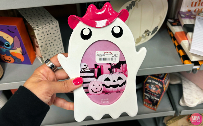 A person holding a Halloween Ghost Picture Frame