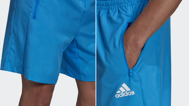 A person wearing an Adidas Mens Aeroready Sport Shorts