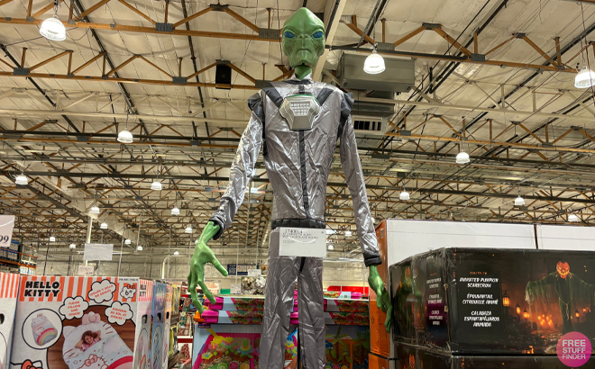 Animated Alien 10 Ft Halloween Decoration in a Store