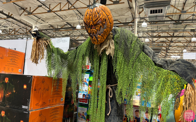 Animated Pumpkin Scarecrow 7 Ft Halloween Decoration in a Store