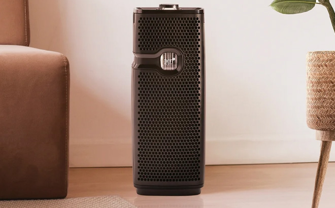 Bionaire True HEPA Mini Tower Air Purifier in Black in a Room