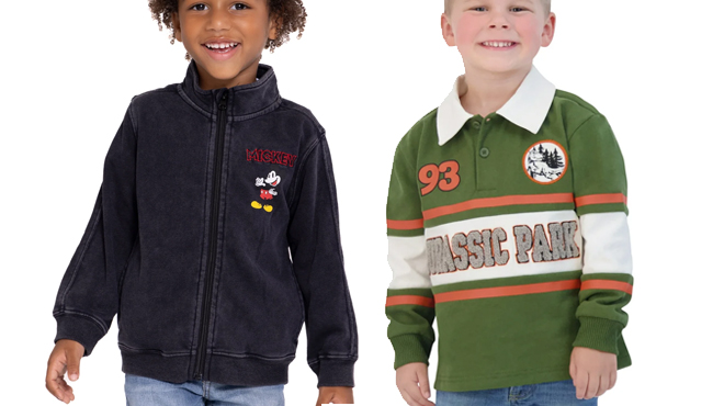 Boys wearing Mickey Mouse Toddler Washed Zip Up Jacket on the left and Jurassic Park Toddler Long Sleeve Polo Shirt on the right