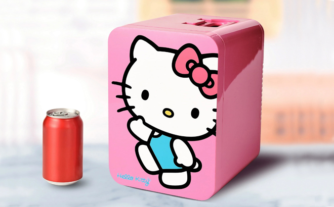 Hello Kitty Pink Mini Fridge with a Can of Soda on a Table