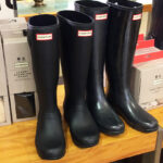 Hunter Womens Original Tall Boots in Black on a Shelf at a Store